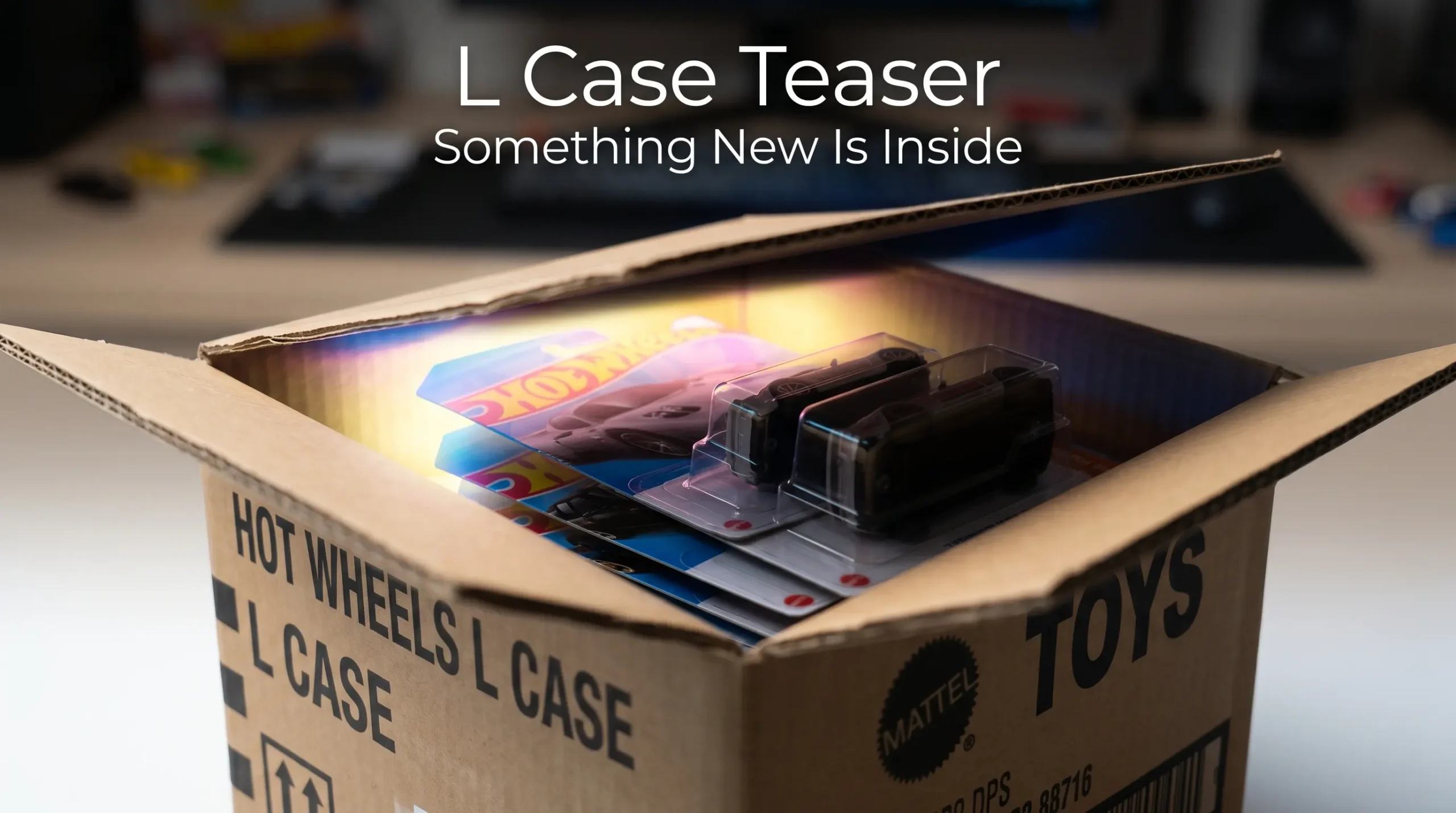 Mystery Hot Wheels L Case unboxing scene with partially opened box, dramatic lighting, and only partially revealed blister pack cars inside creating suspenseful collector teaser atmosphere.