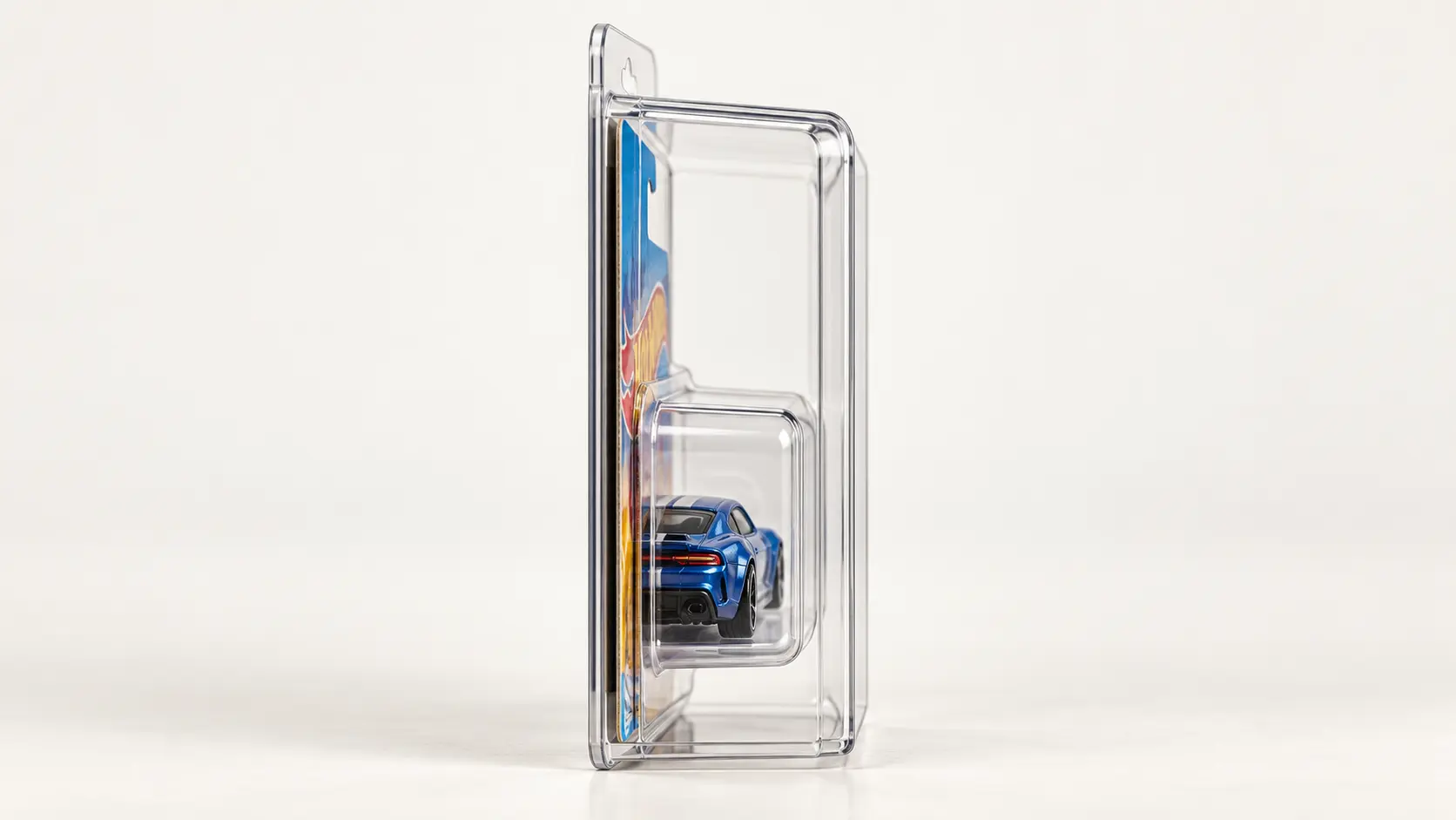 Technical illustration distinguishing a backing card and blister bubble from the clear outer protector