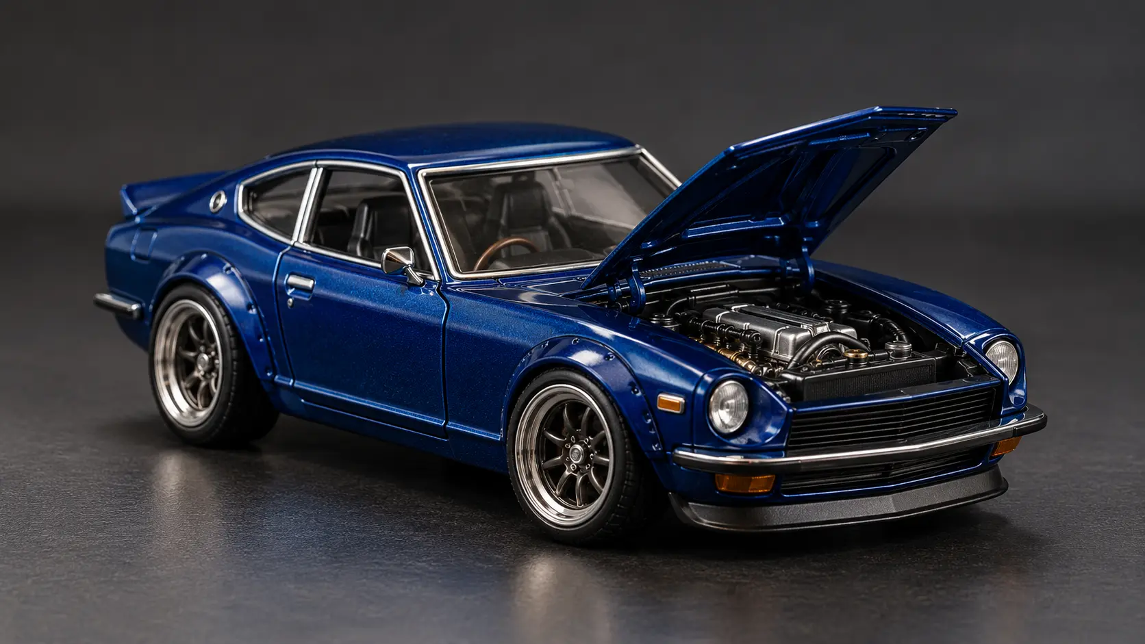 Illustrative close-up of a miniature die-cast collectible with metallic paint, rubber-style tires and a raised hood revealing engine detail.